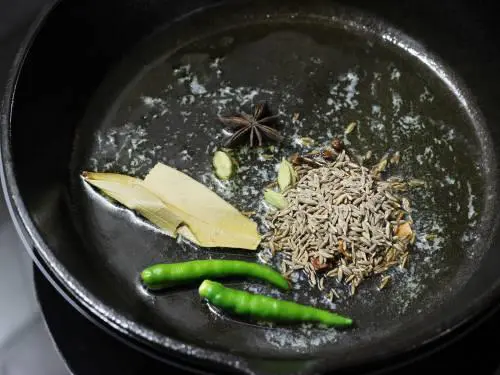 adding spices to butter