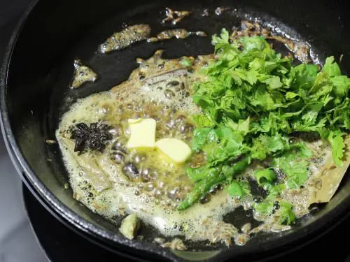 adding coriander leaves 