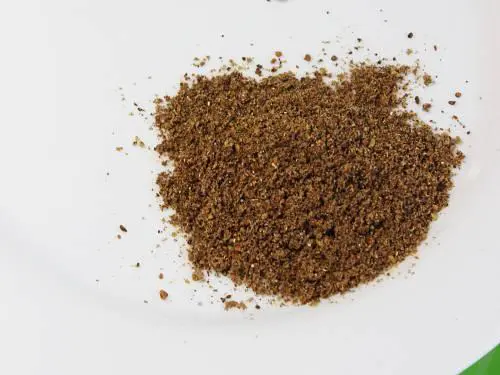 fresh ground masala chai powder ready to store in jar