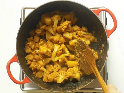 stir frying aloo gobi masala