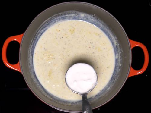 pouring cream to boil kulfi mixture