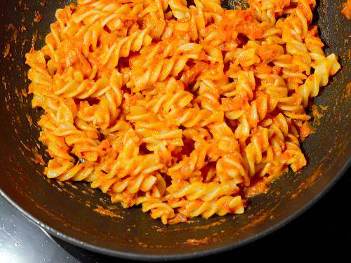 prepared red sauce pasta in pan