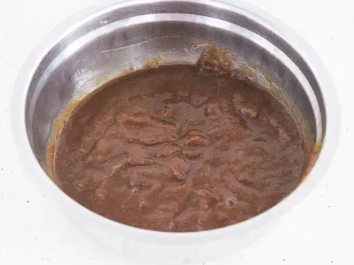 Making tamarind paste for pulihora