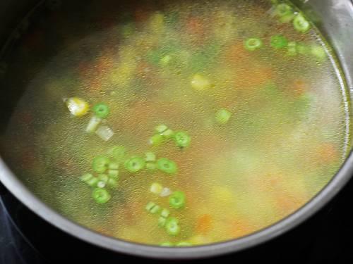 pouring water to make sweet corn soup