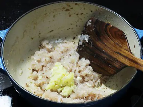 frying onions and ginger garlic to make bharwa baingan