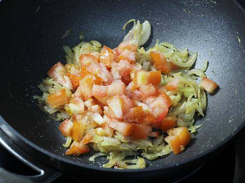 adding tomatoes salt & turmeric