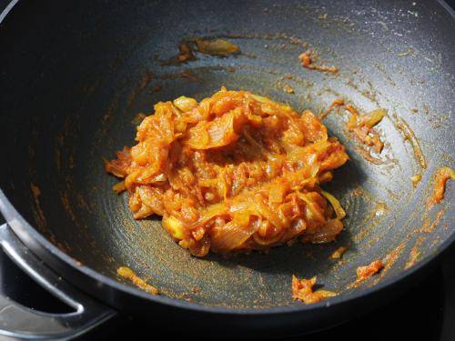 sauteing the onion tomato masala for chana masala