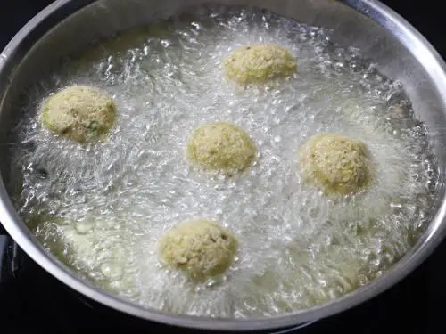 deep frying falafel in hot oil