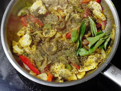 sprinkle curry leaves and spice powder