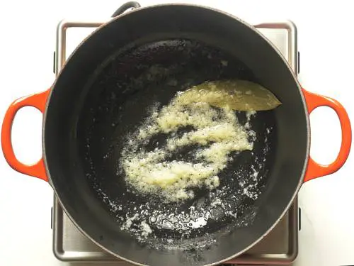 sauteing spices and ginger in oil