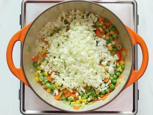 adding cabbage for vegetable soup