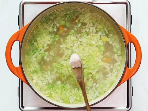 adding salt sugar to soup