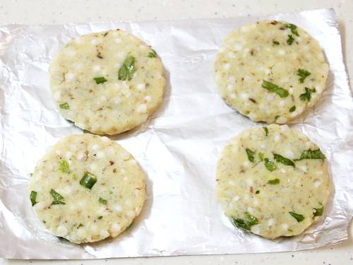 making sabudana vada on a foil