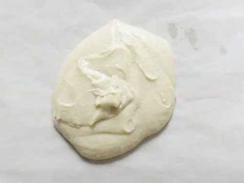 badam katli mixture on a parchment paper