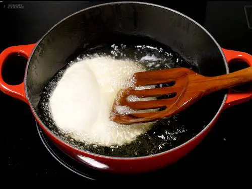 frying bhatura in hot oil