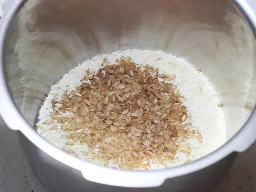adding rice to pot for thayir sadam