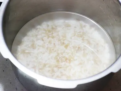 cooking rice in a pot