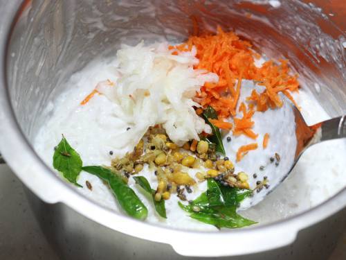 addition of seasoning to pan to make curd rice