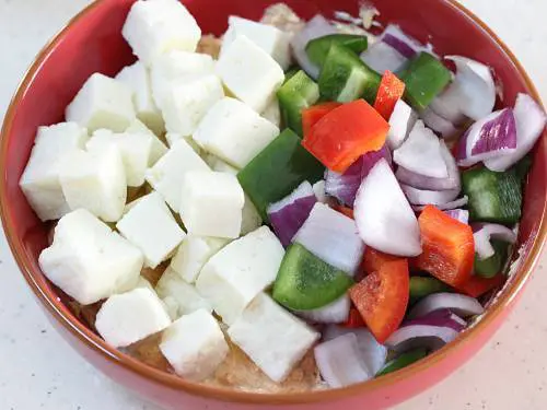 adding paneer to make marinade