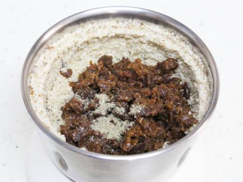 adding jaggery and cardamom powder for walnut ladoo
