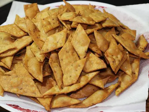 fried namak para in a colander or plate
