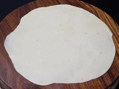 roll the dough to make shankarpali