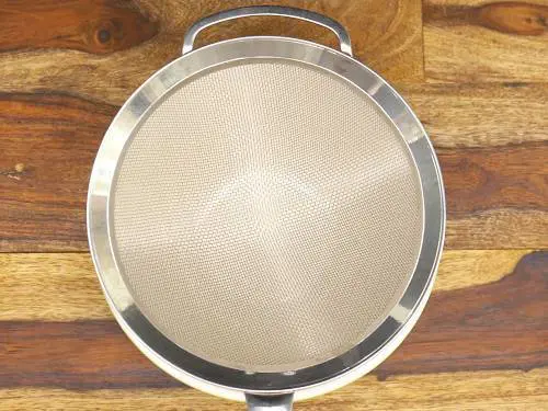 place a strainer over a bowl