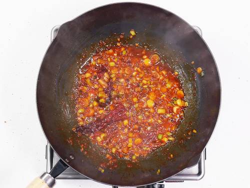 bubbling sauce in the pan