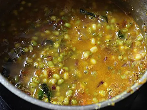 cooking green moong dal curry