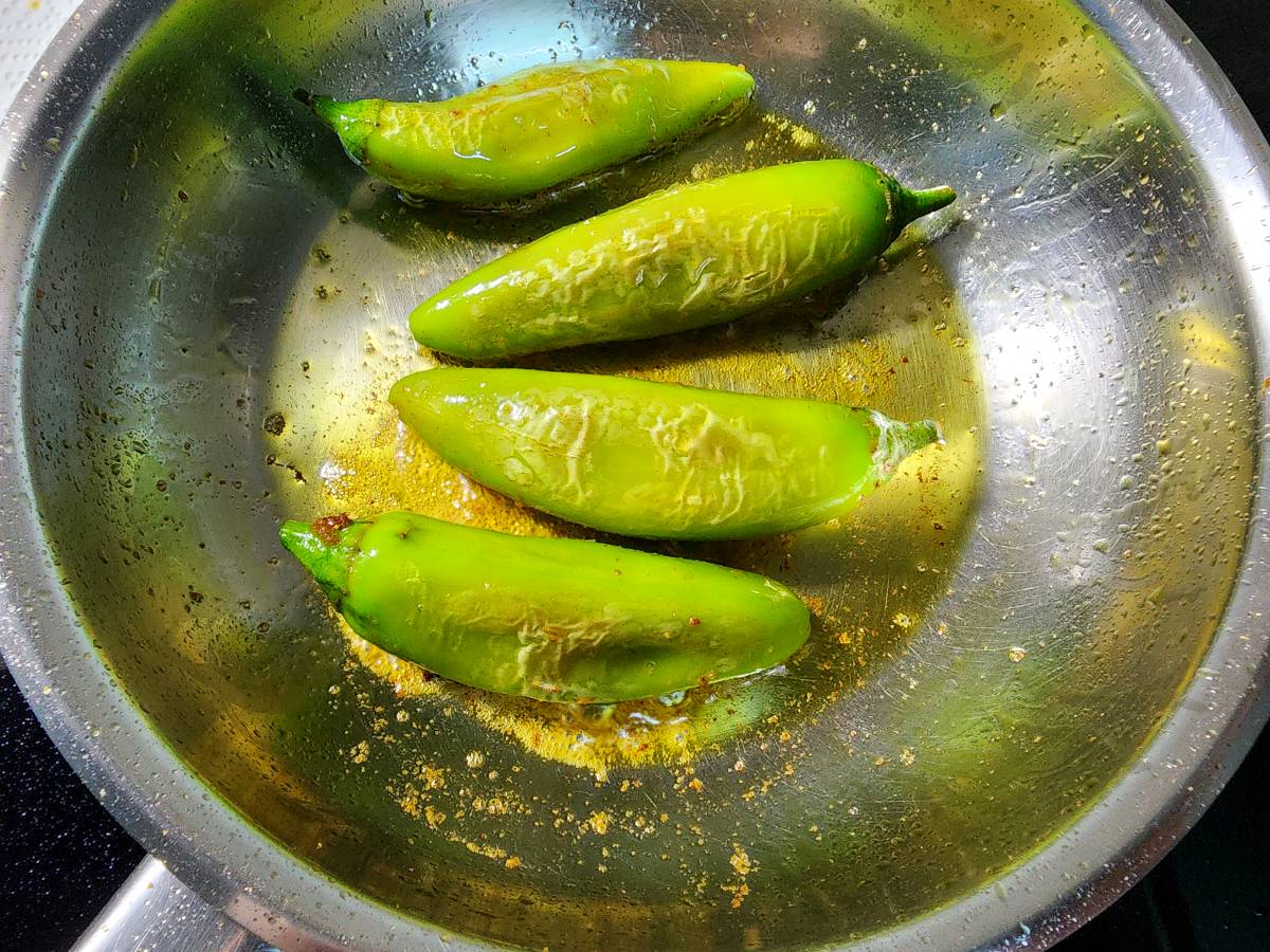 pan-fried spicy stuffed green chili peppers to make achari chicken
