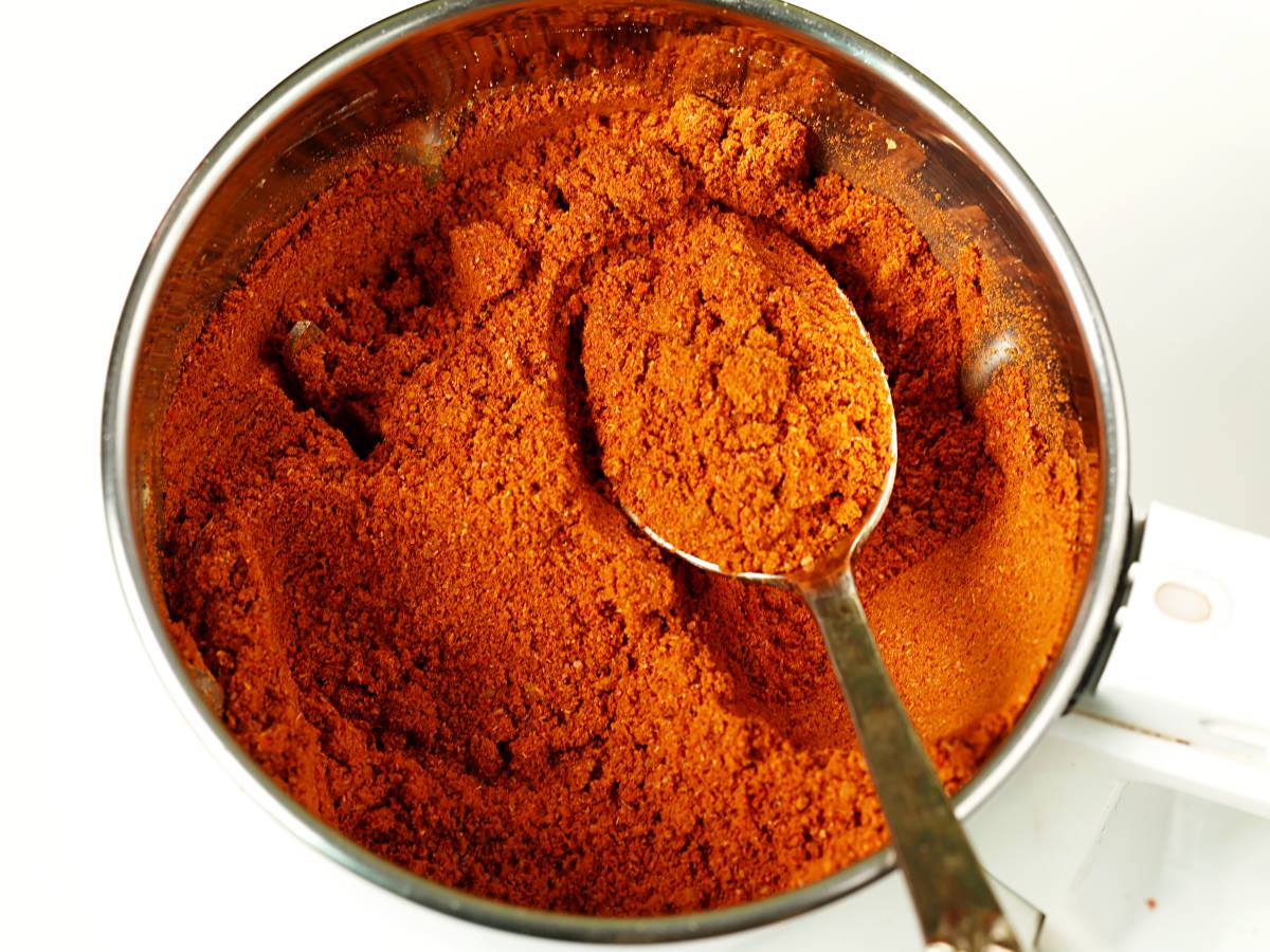 fresh ground achari masala in a blender