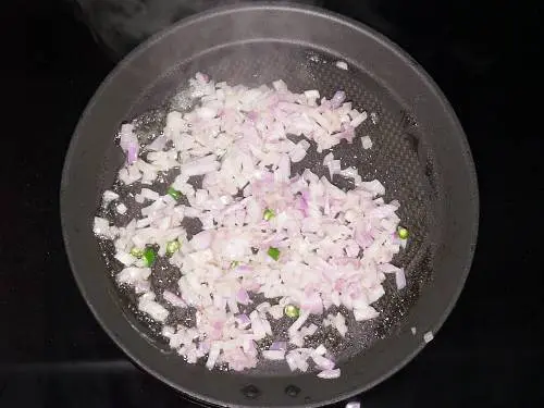 sauteing onions in butter for masala pav