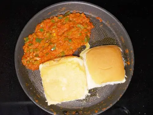 frying bread on a tawa