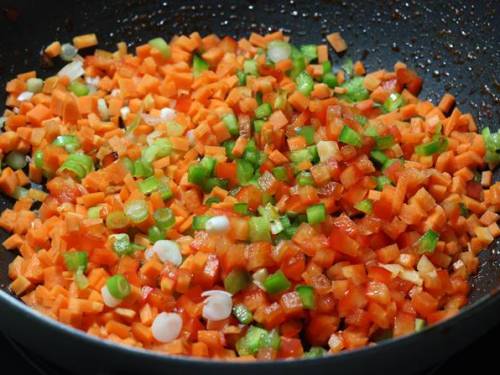 frying veggies in a pan