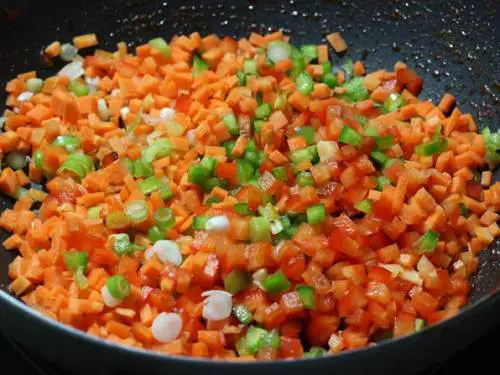 frying veggies in a pan