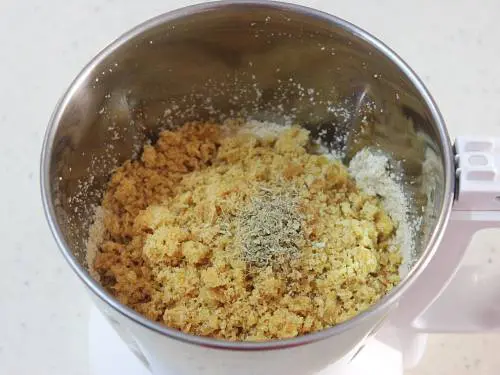 adding jaggery to make sesame seeds ladoo