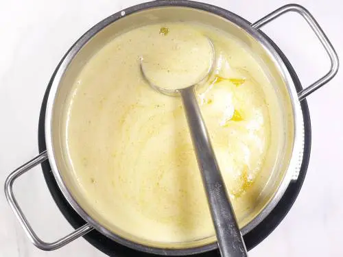 frothy butter simmering in pot