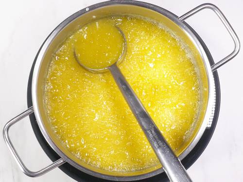 bubbling butter to make ghee