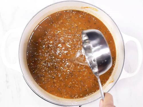 adding more water to cook dal makhani