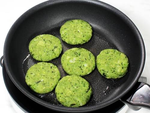 frying the patties in oil