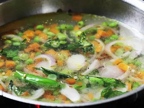 pouring water to the pan