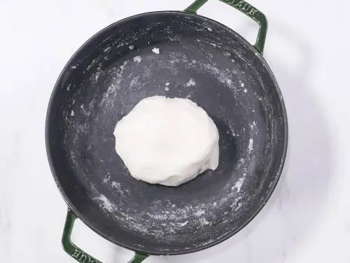 kneading dough to smooth texture for modak
