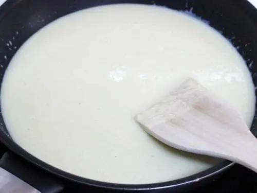 gooey doodh peda mixture in a pan