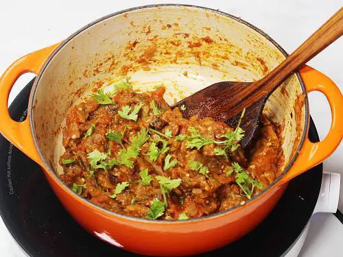 garnishing with coriander leaves