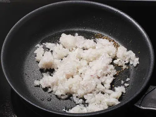 adding onions to pan