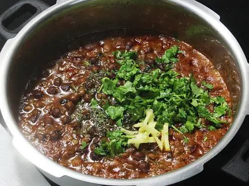 adding kasuri methi coriander leaves