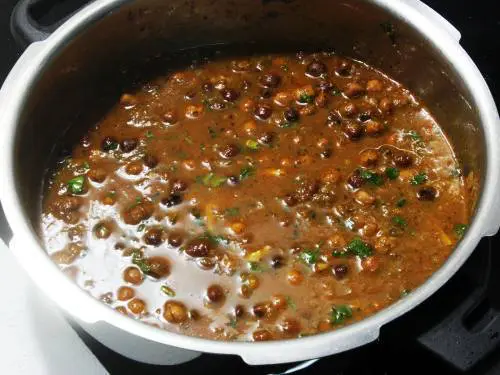 kala chana ready to serve in a cooker