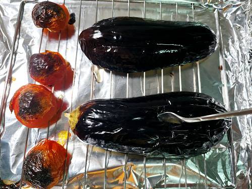 a fork inserted into the eggplant goes in smoothly