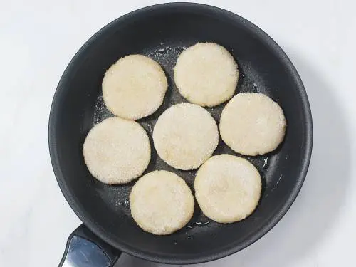 frying patties in pan