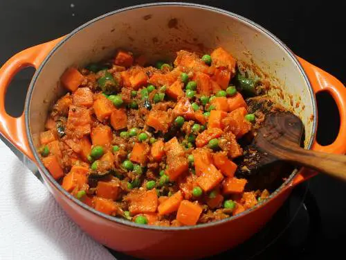 stir frying carrot and peas